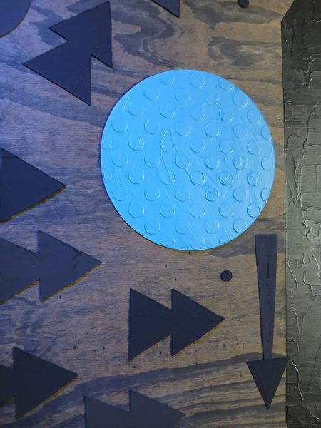 Modern geometric abstract composition painted on plaster canvas base