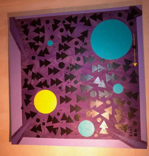 Physical abstract artwork with hand-painted geometric patterns