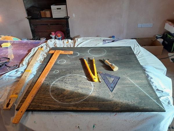 Detail work on geometric pattern alignment on physical canvas