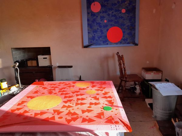 Studio scene showing traditional analog art creation tools